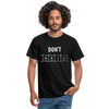 Männer T-Shirt: Don‘t panic - Schwarz